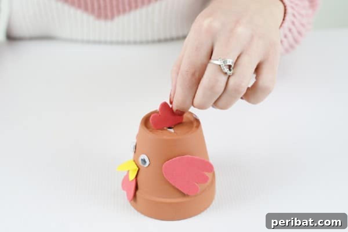 Craft Your Own Cute Flower Pot Chicken 14 Gluing red top to flower pot chicken