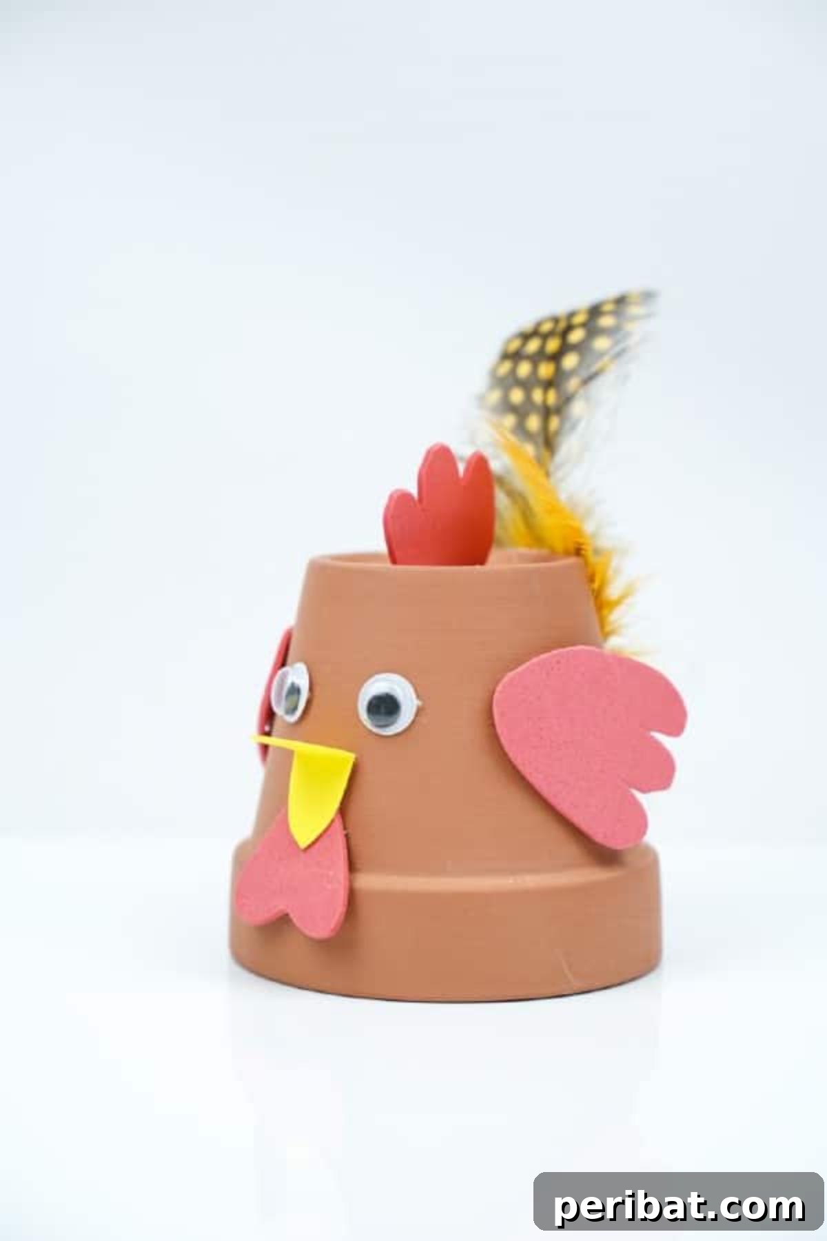 Craft Your Own Cute Flower Pot Chicken 5 Terra cotta flower pot bird with yellow feathers