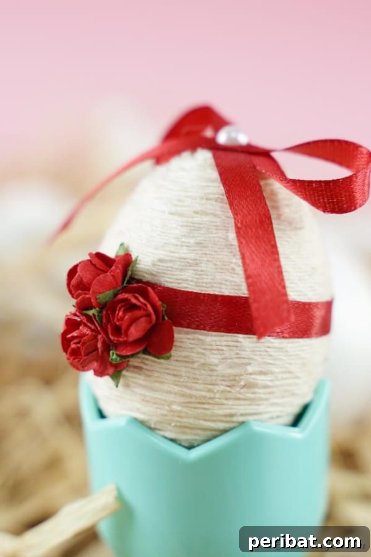 Crafting Yarn Wrapped Easter Eggs 5 Side view of a handcrafted yarn and ribbon covered Easter egg