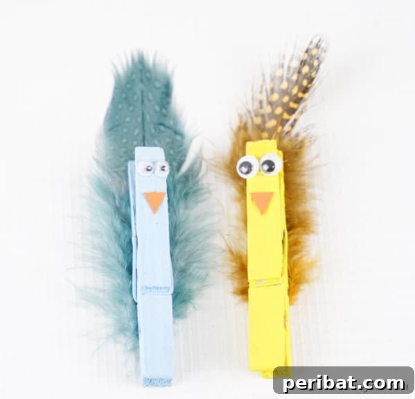 Whimsical Repurposed Clothespin Birds 12 Clothespin birds on white table