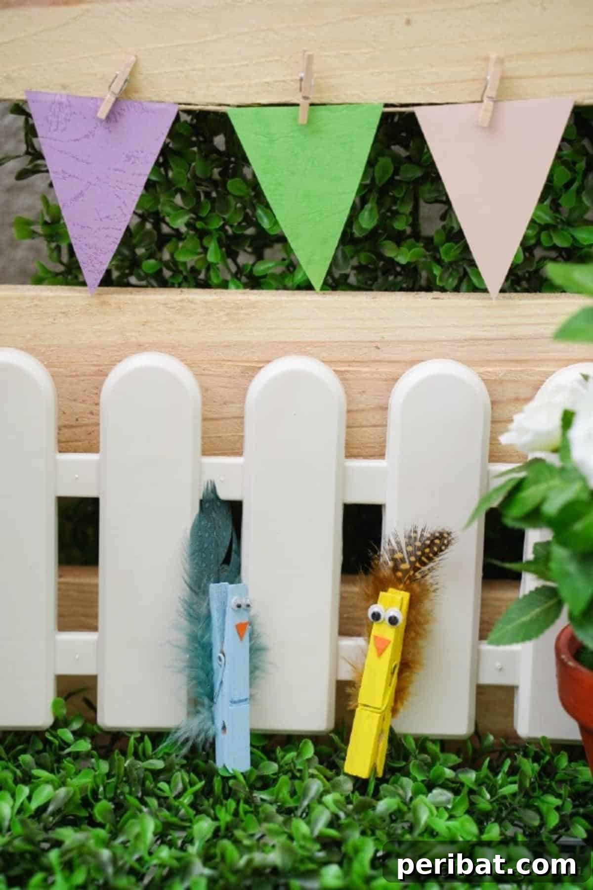 Whimsical Repurposed Clothespin Birds 4 Clothespin birds against mini white fence