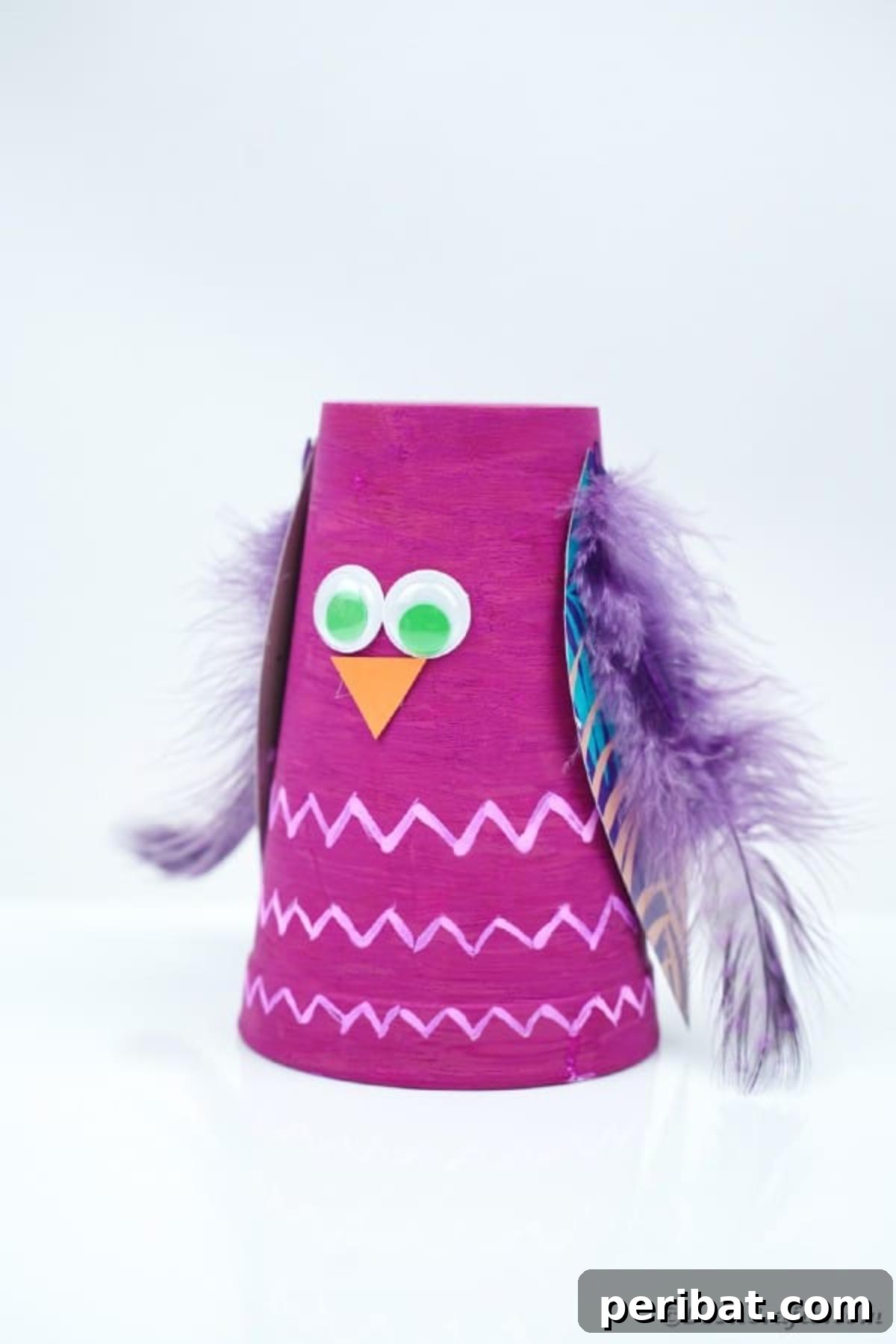 Turn Plastic Cups Into Charming Owls 14 The finished plastic cup owl craft, ready for display.