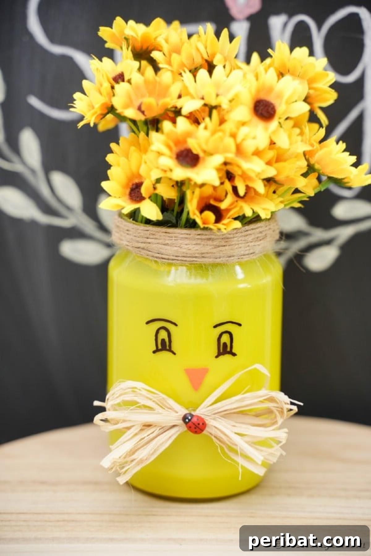 Repurposed Mason Jar Hen House Vase 13 Finished mason jar chicken vase displayed in front of a chalkboard