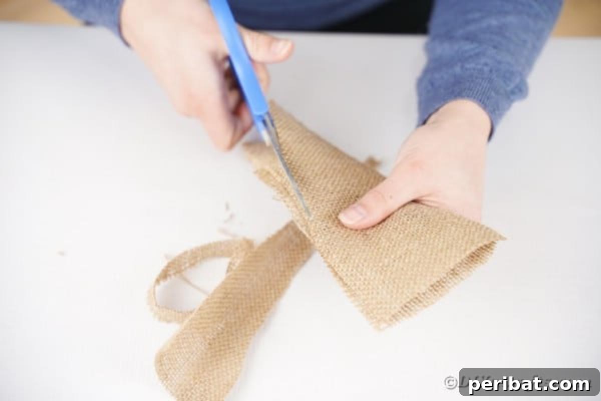 Hoppy Easter Bunny Wall Art DIY 14 Cutting two large ear shapes from burlap fabric