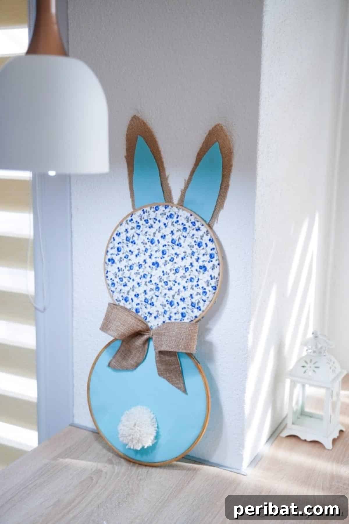 Hoppy Easter Bunny Wall Art DIY 3 DIY bunny wall art decoration leaning against a wall on a table