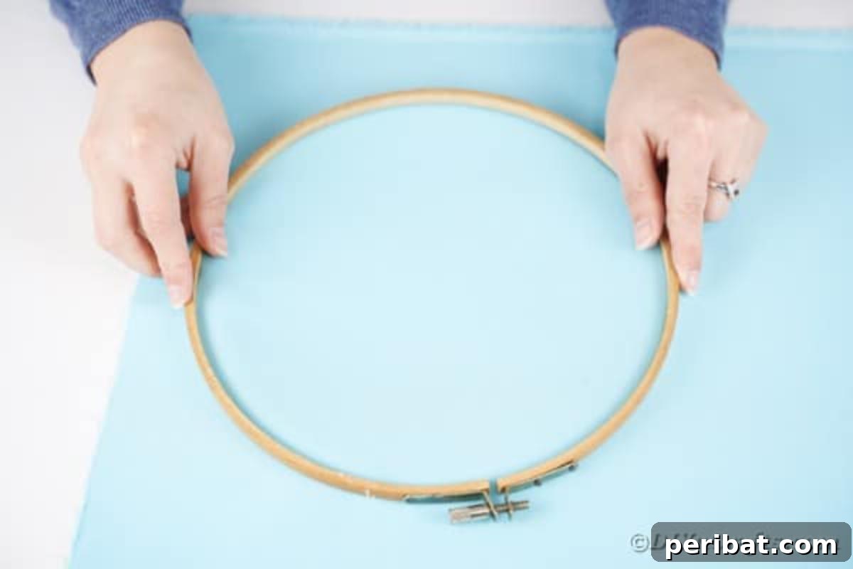 Hoppy Easter Bunny Wall Art DIY 7 Measuring fabric against an embroidery hoop