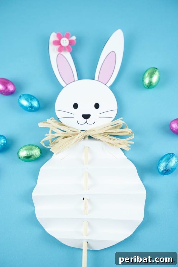 DIY Easter Paper Bunny Craft Free Printable Template 27 A finished paper Easter bunny on a stick, ready for display