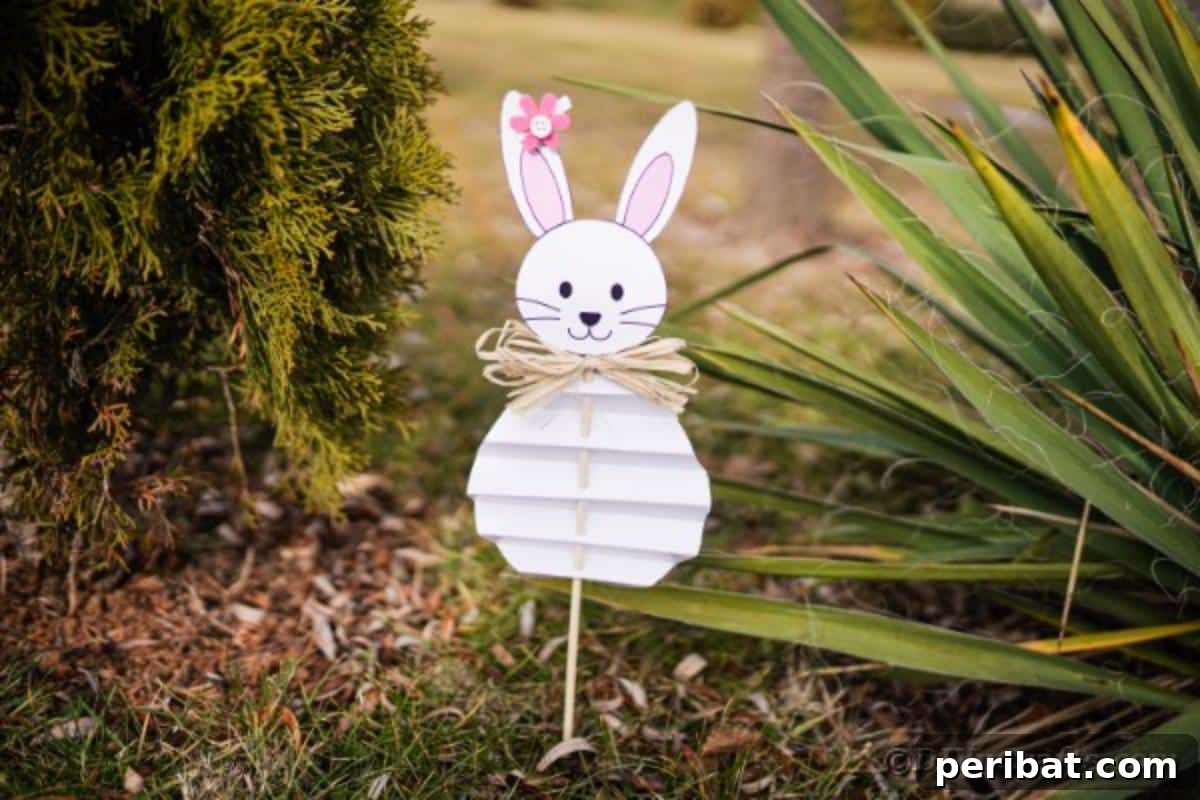 DIY Easter Paper Bunny Craft Free Printable Template 4 Paper Easter bunny positioned outdoors within a lush garden setting