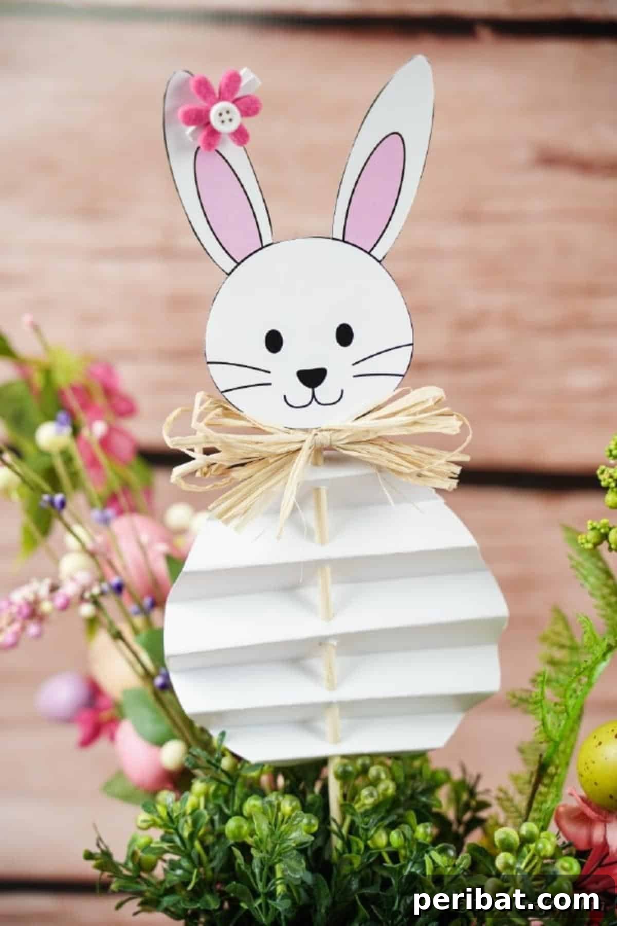 DIY Easter Paper Bunny Craft Free Printable Template 5 Easter bunny craft stuck inside a potted plant against a wall
