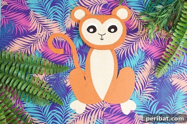 A playful illustration of a monkey crafted from paper, suitable for a kids' project or a creative card design.