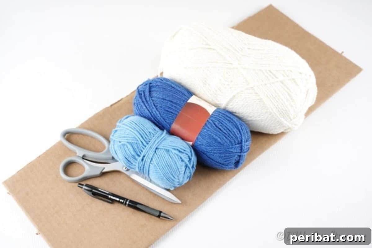 Collection of craft supplies for making the yarn pom pom cloud