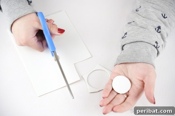 Cutting circle of white paper