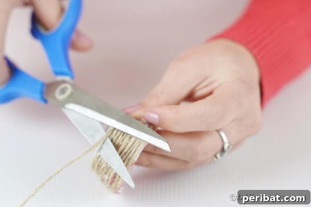 Cutting twine on egg carton