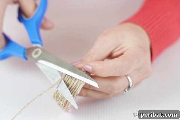 Cutting twine on egg carton