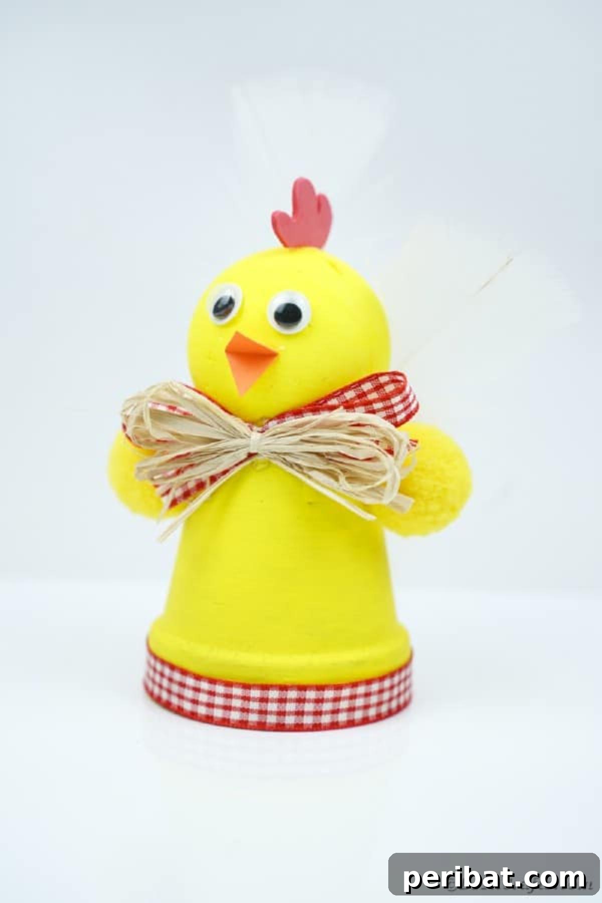Whimsical Upcycled Hen Planter for Easter Decor 15 Completed upcycled planter chicken Easter craft on a white table