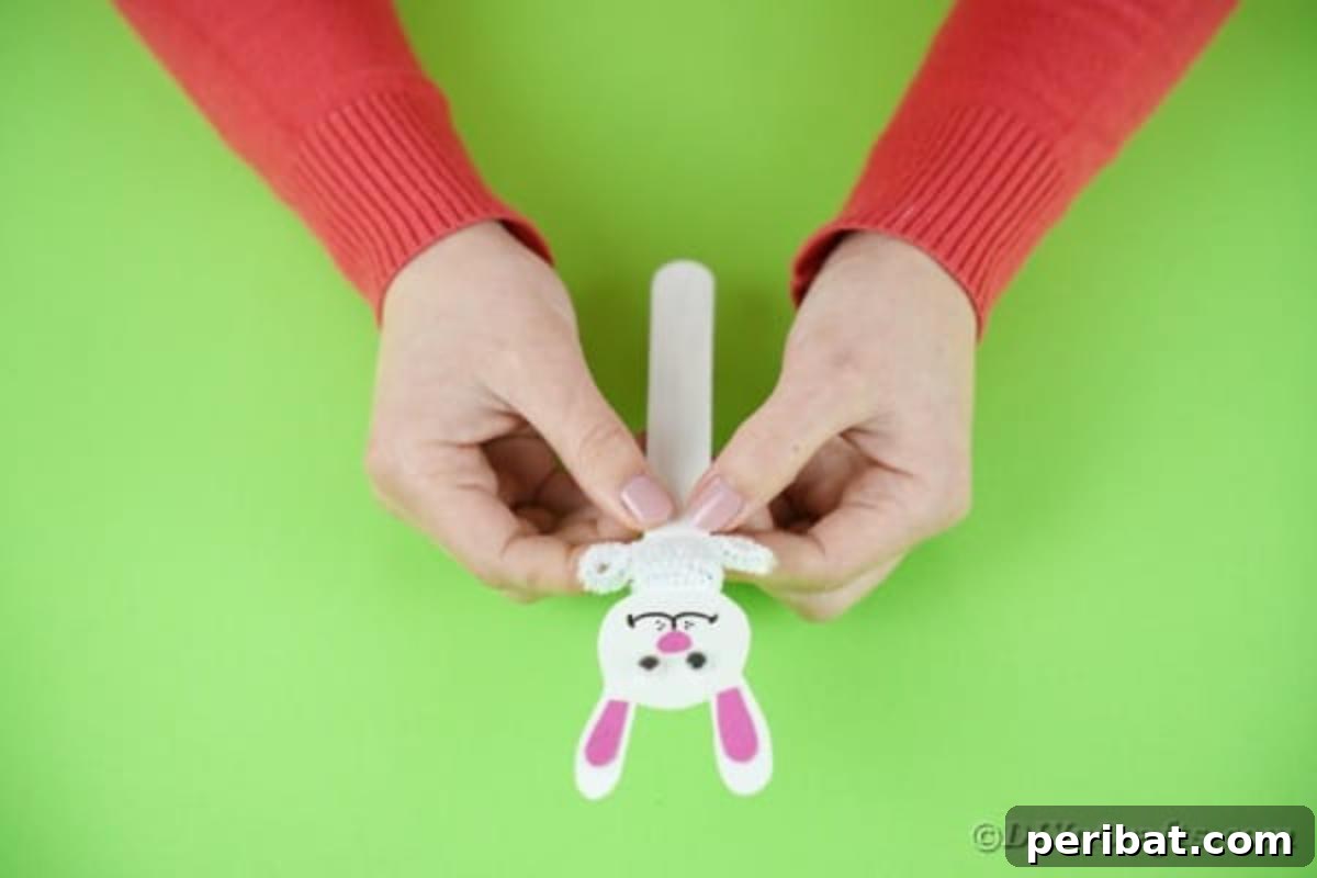Popsicle Stick Easter Critter Bookmarks 13 Adding pipe cleaner to bunny