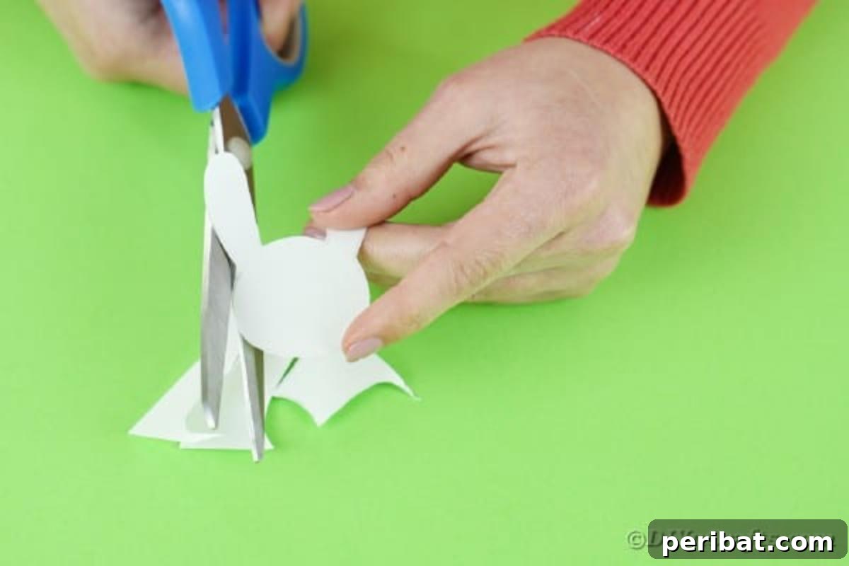 Popsicle Stick Easter Critter Bookmarks 7 Cutting out bunny head from paper