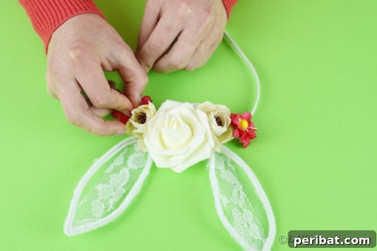 Adding a small artificial flower to the base of each bunny ear on the headband