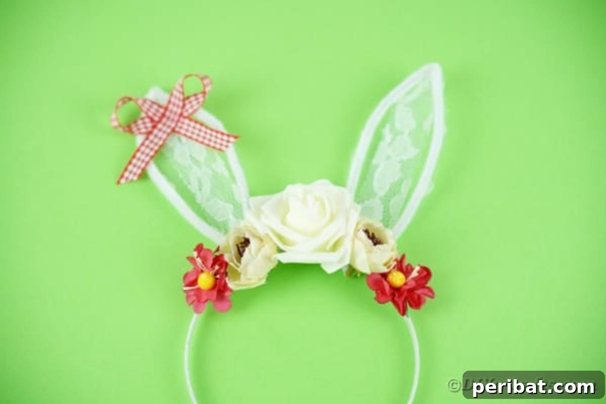 Easter bunny ears headband crafted from lace on a vibrant green surface