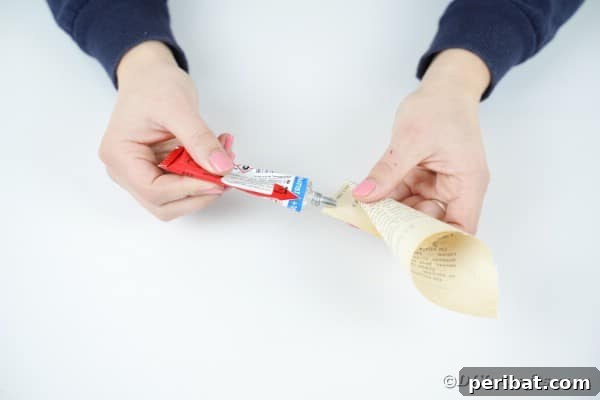Aged Book Wreath Craft: Complete Video How-To 13 Gluing paper cones