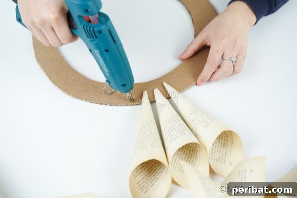 Aged Book Wreath Craft: Complete Video How-To 15 Gluing paper cones onto wreath