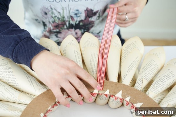 Aged Book Wreath Craft: Complete Video How-To 20 Adding hanging loop on wreath