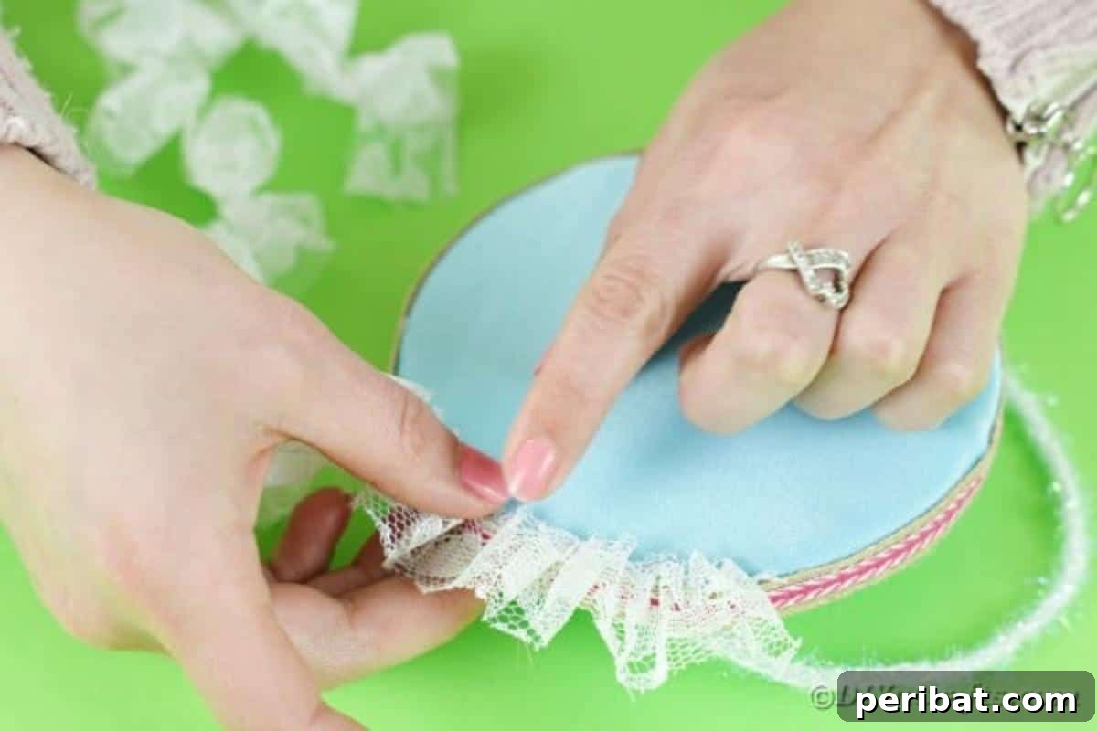 DIY CD Pincushion Basket: Upcycle Tutorial 15 Gluing lace around edge of CD
