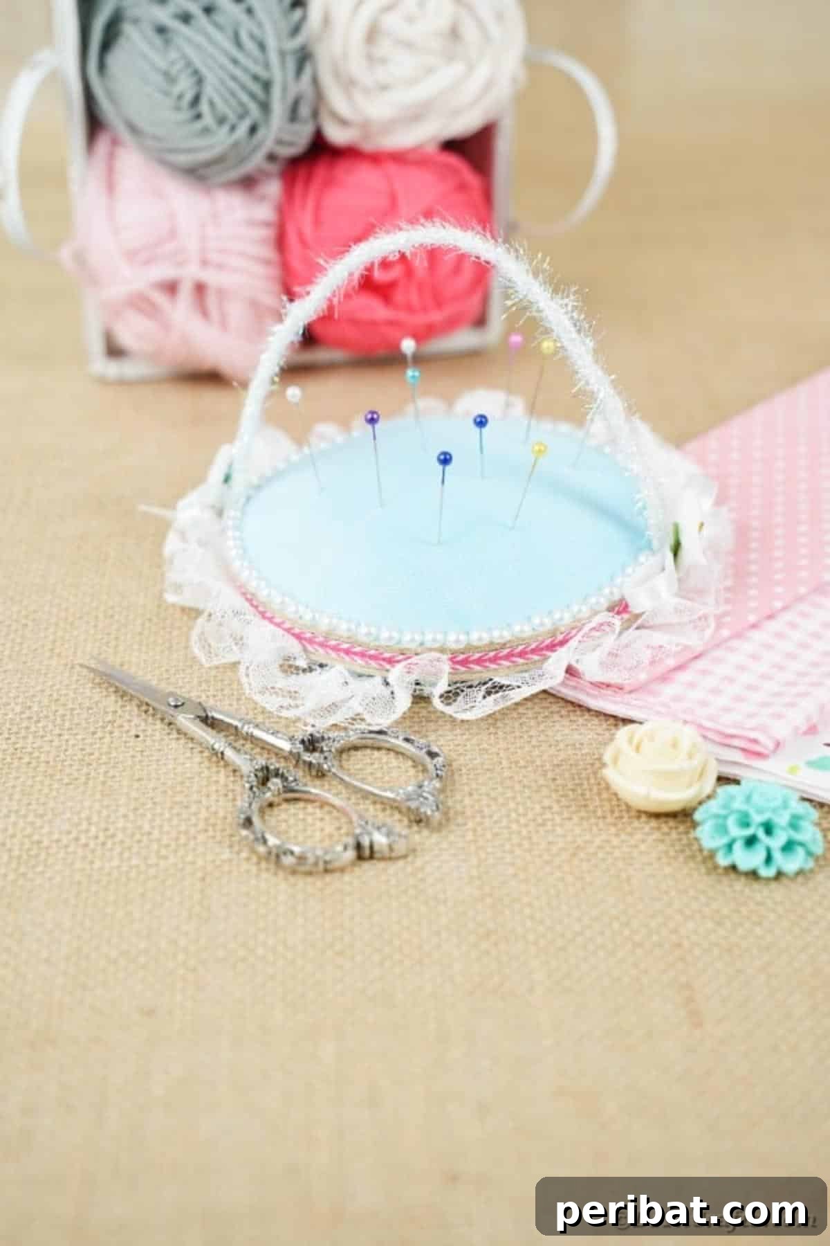 DIY CD Pincushion Basket: Upcycle Tutorial 4 Old CD Pincushion on table with yarn