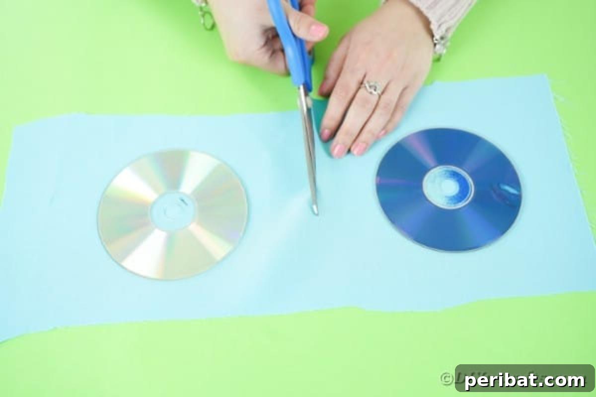 DIY CD Pincushion Basket: Upcycle Tutorial 7 Measuring cd's against fabric