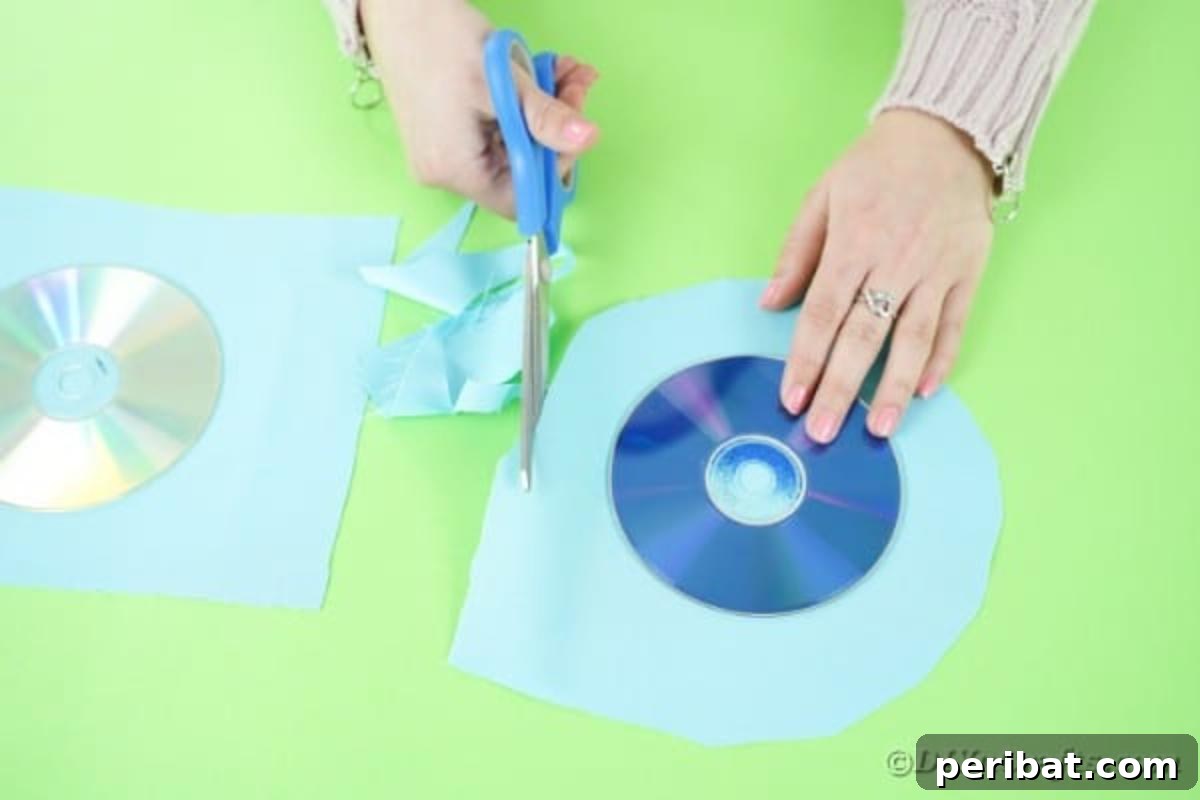 DIY CD Pincushion Basket: Upcycle Tutorial 8 Cutting fabric to fit around CD