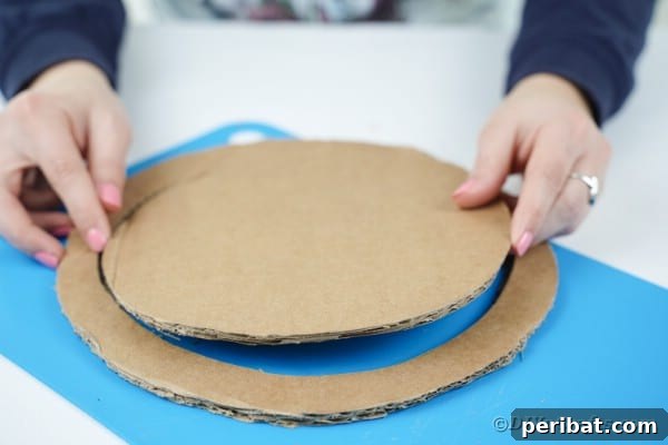 Enchanting Vintage Book Page Wreath Craft 22 Cutting out wreath from cardboard