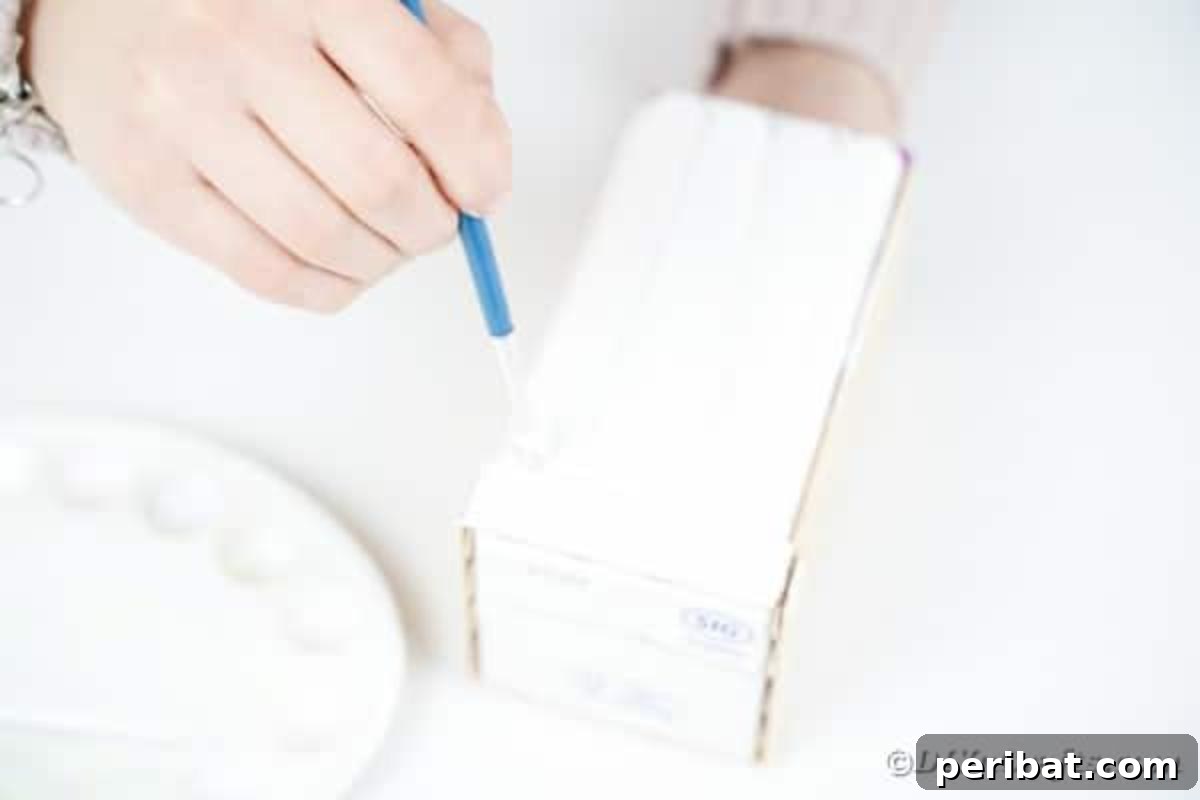 Craft Your Own Milk Carton Organizer Tutorial 12 Painting craft sticks white
