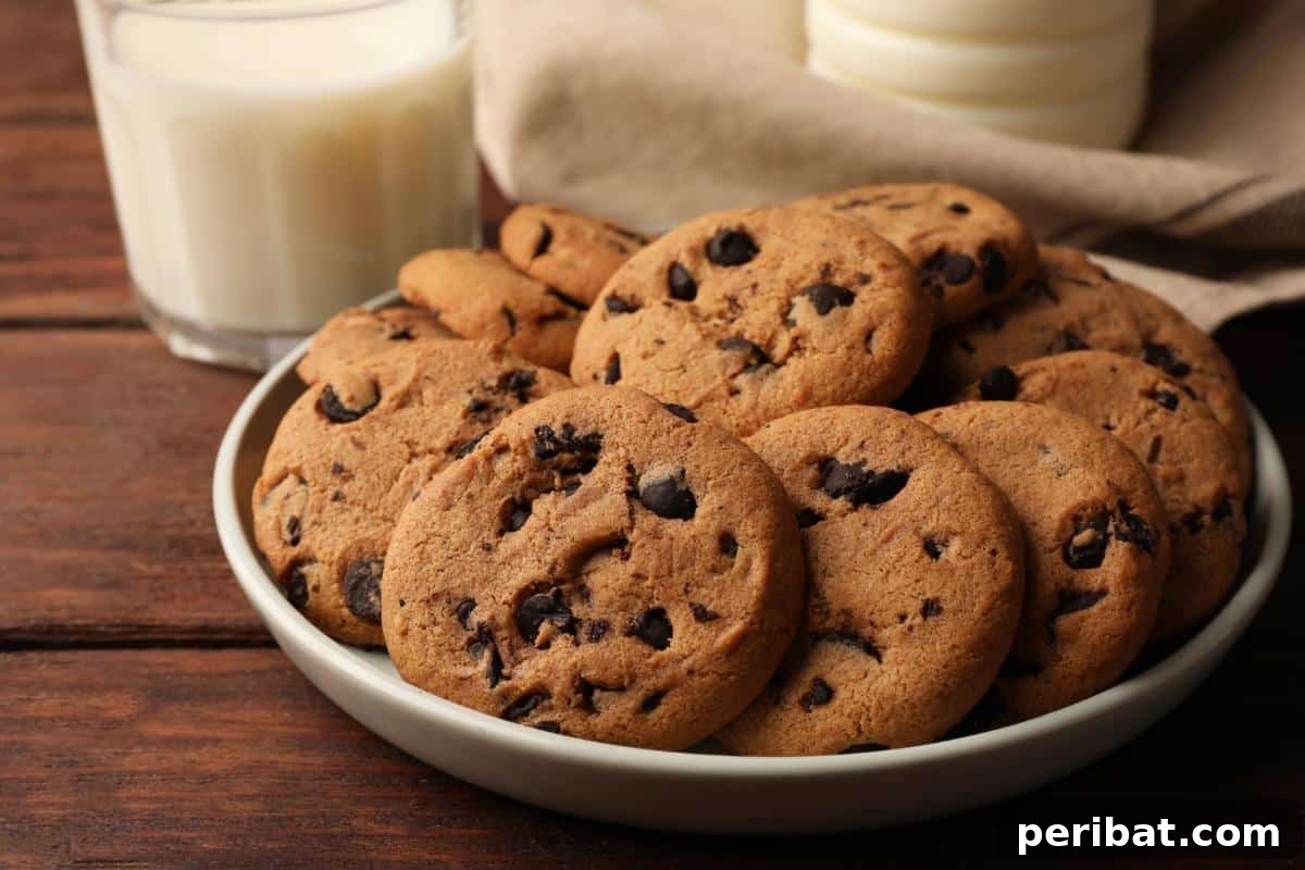 A plate full of freshly baked cookies, representing various baked goods that can be frozen for extended enjoyment.