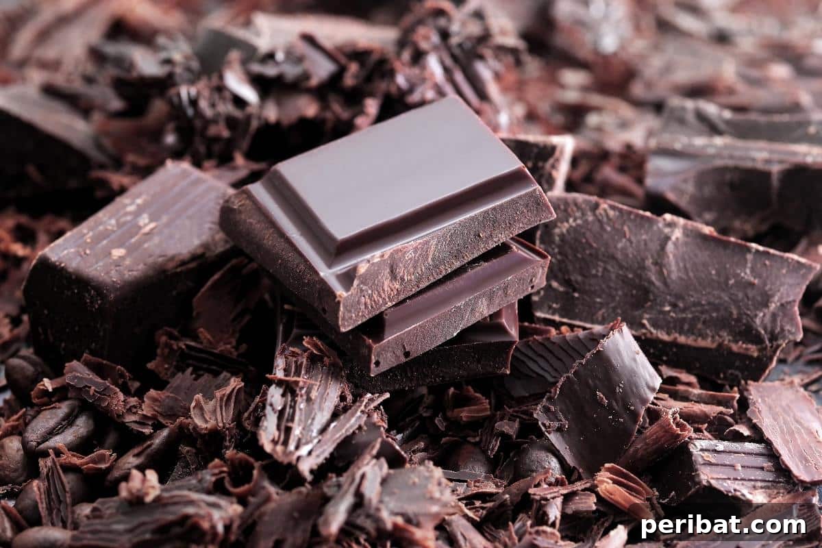 Dark chocolate bars, demonstrating that this beloved sweet can be safely frozen with the right technique to preserve its quality.
