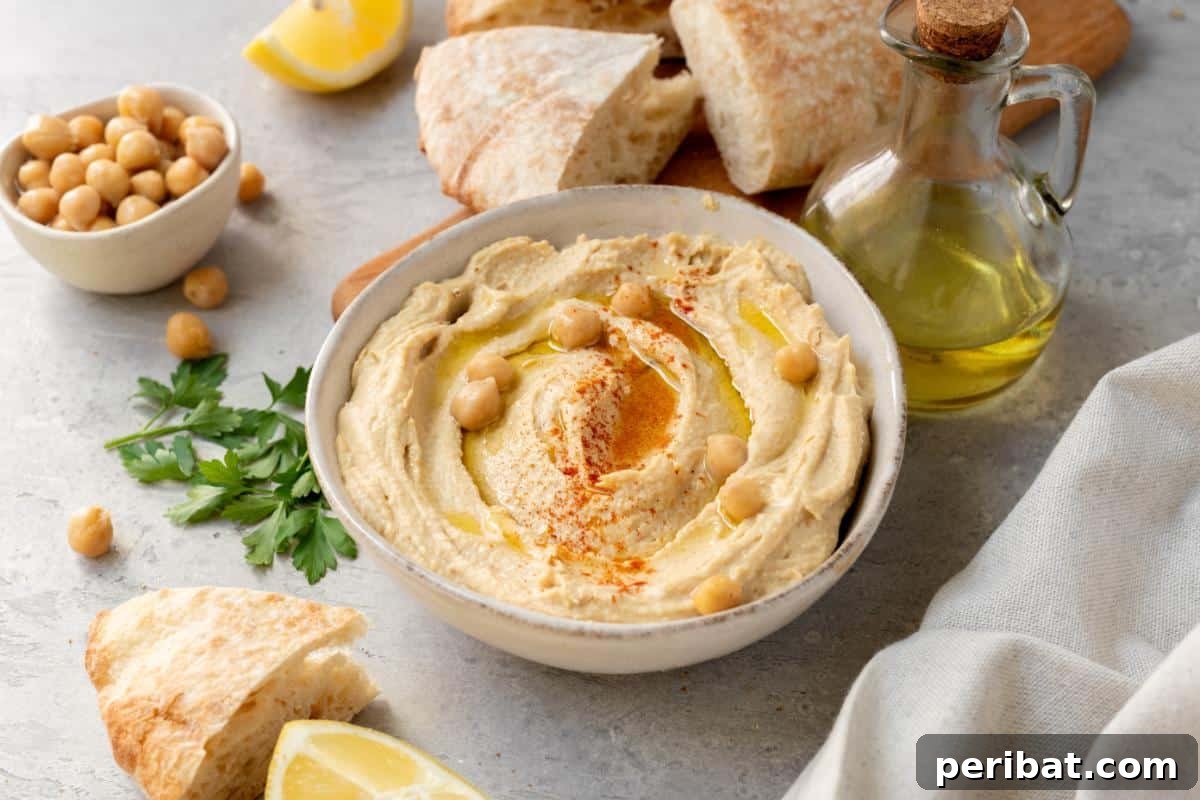 A bowl of creamy hummus, a healthy dip that can be frozen to prevent spoilage and extend its freshness.