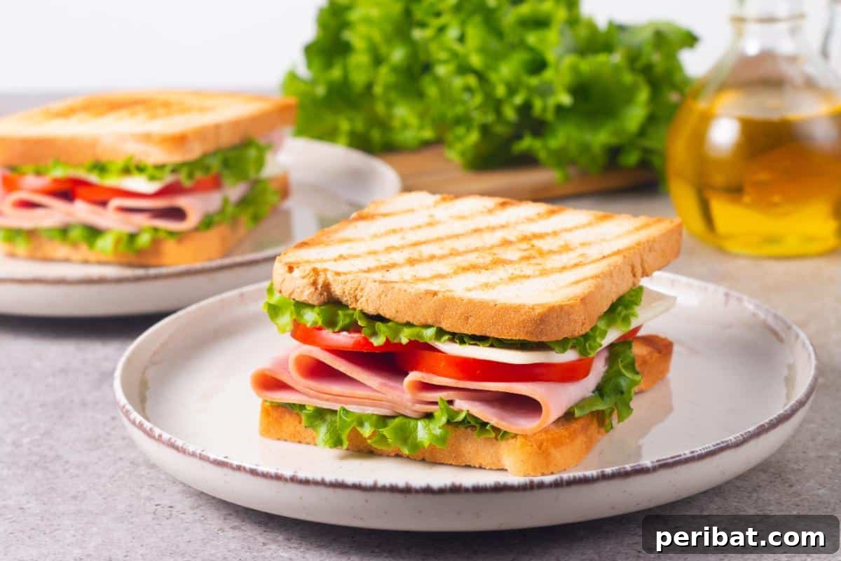 Scrumptious sandwiches, demonstrating a practical meal prep strategy for busy individuals by freezing.
