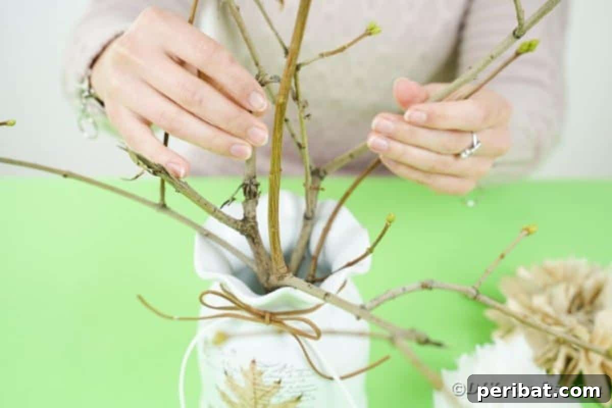 Arranging sticks in vase