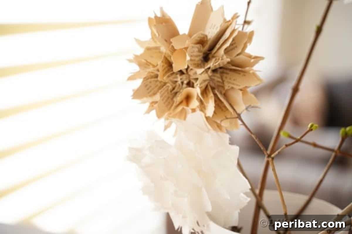 Old book page flower on stick