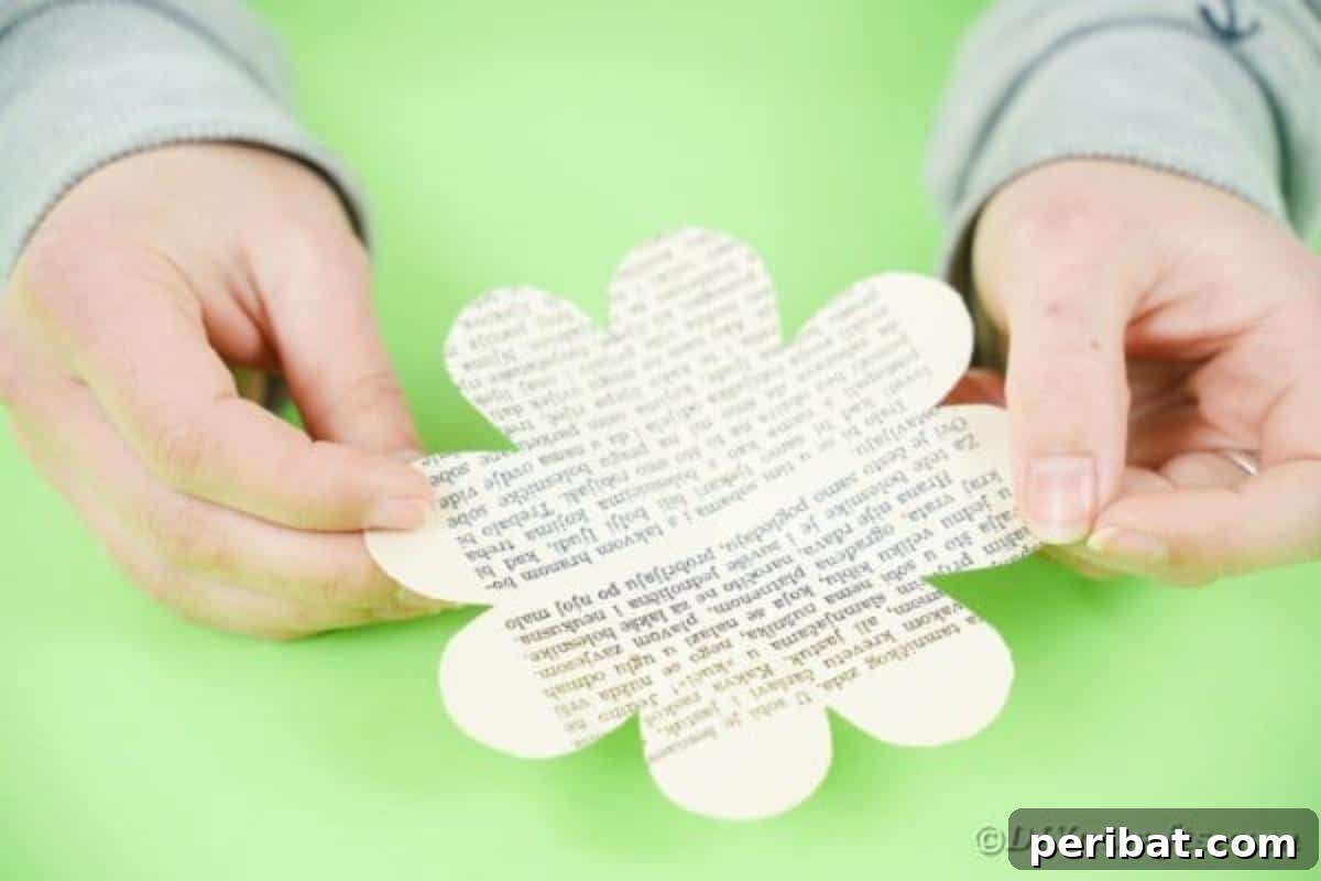 An unfolded paper showing a symmetrical flower shape