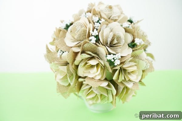 Close-up of an old book page rose bouquet, highlighting its texture