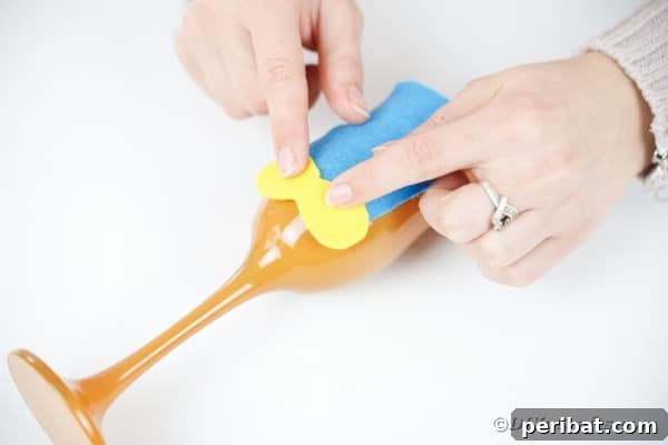 Gluing yellow eye shape on wine glass
