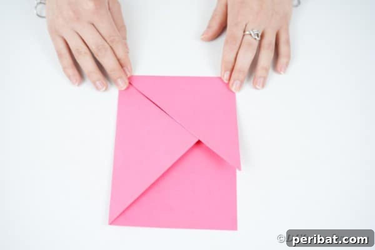Elegant Origami Envelopes: A DIY Paper Craft Video Tutorial 11 Creating paper envelope