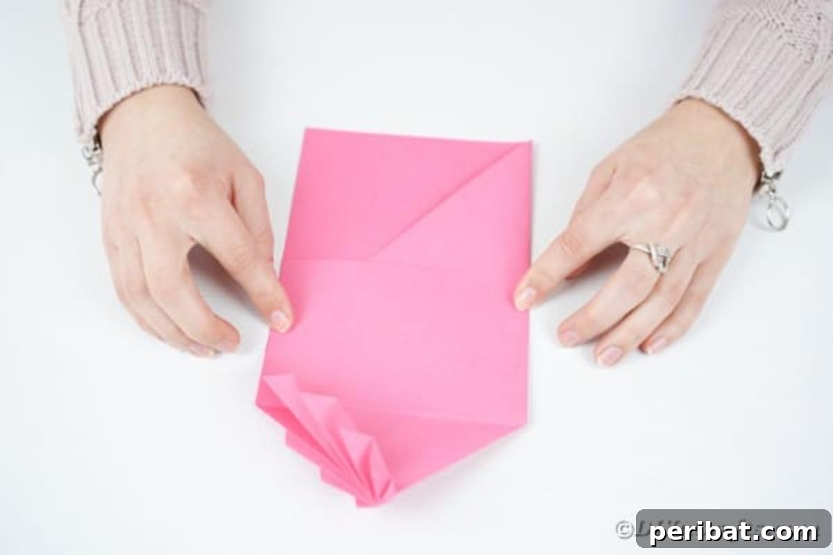 Elegant Origami Envelopes: A DIY Paper Craft Video Tutorial 15 Folding top flap of envelope