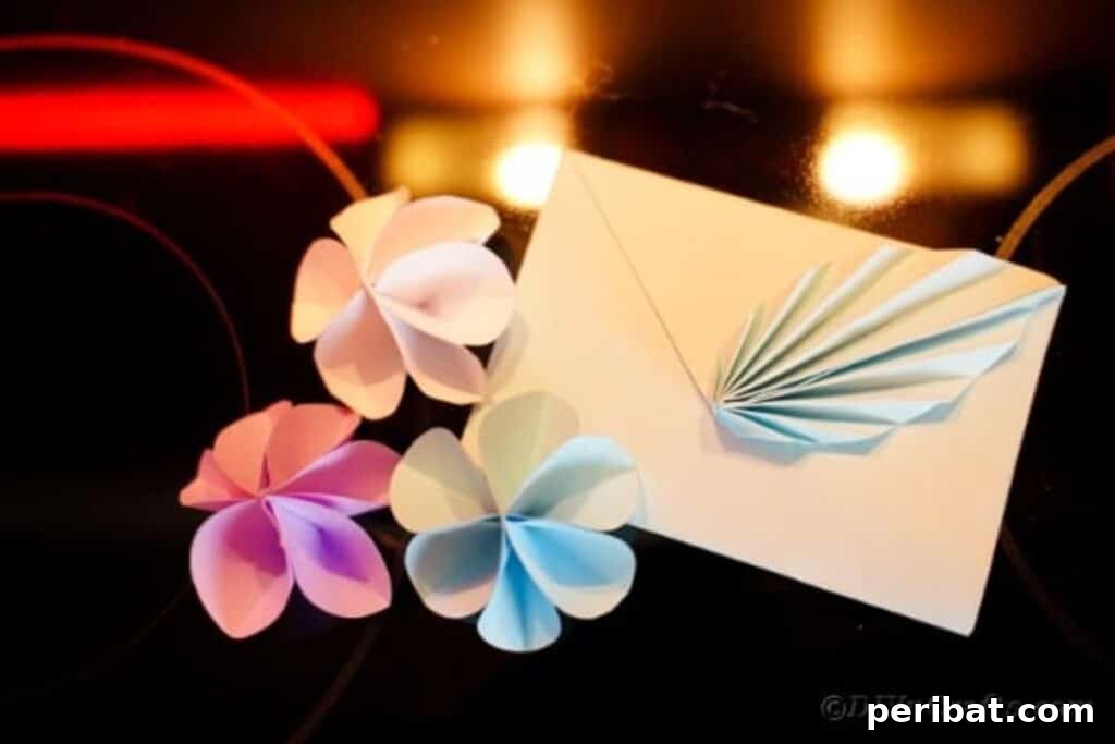 Elegant Origami Envelopes: A DIY Paper Craft Video Tutorial 27 Origami envelope with flowers on table