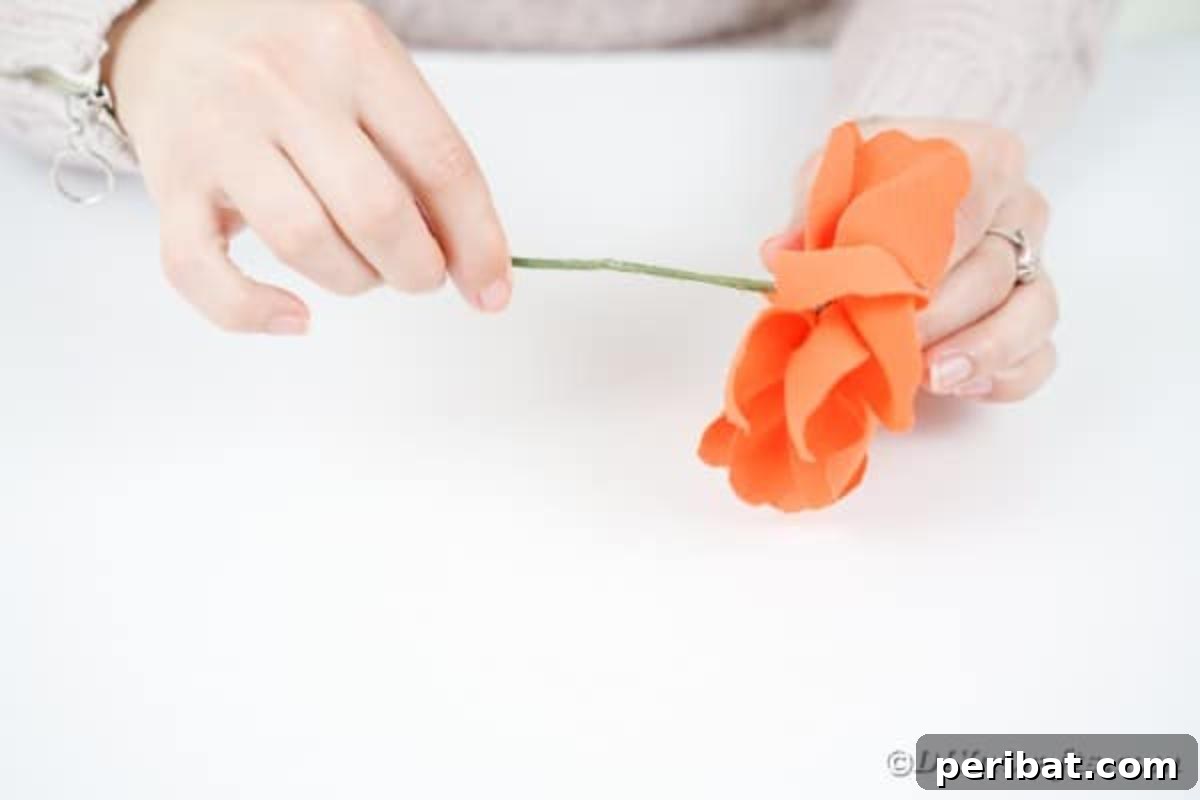 Your Easy Guide to Fabric Flower Bouquets Video 17 Gluing a floral wire stem onto the back of a fabric flower