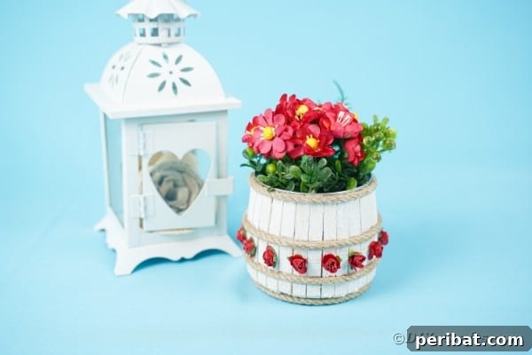 Clothespin tin can organizer on blue table