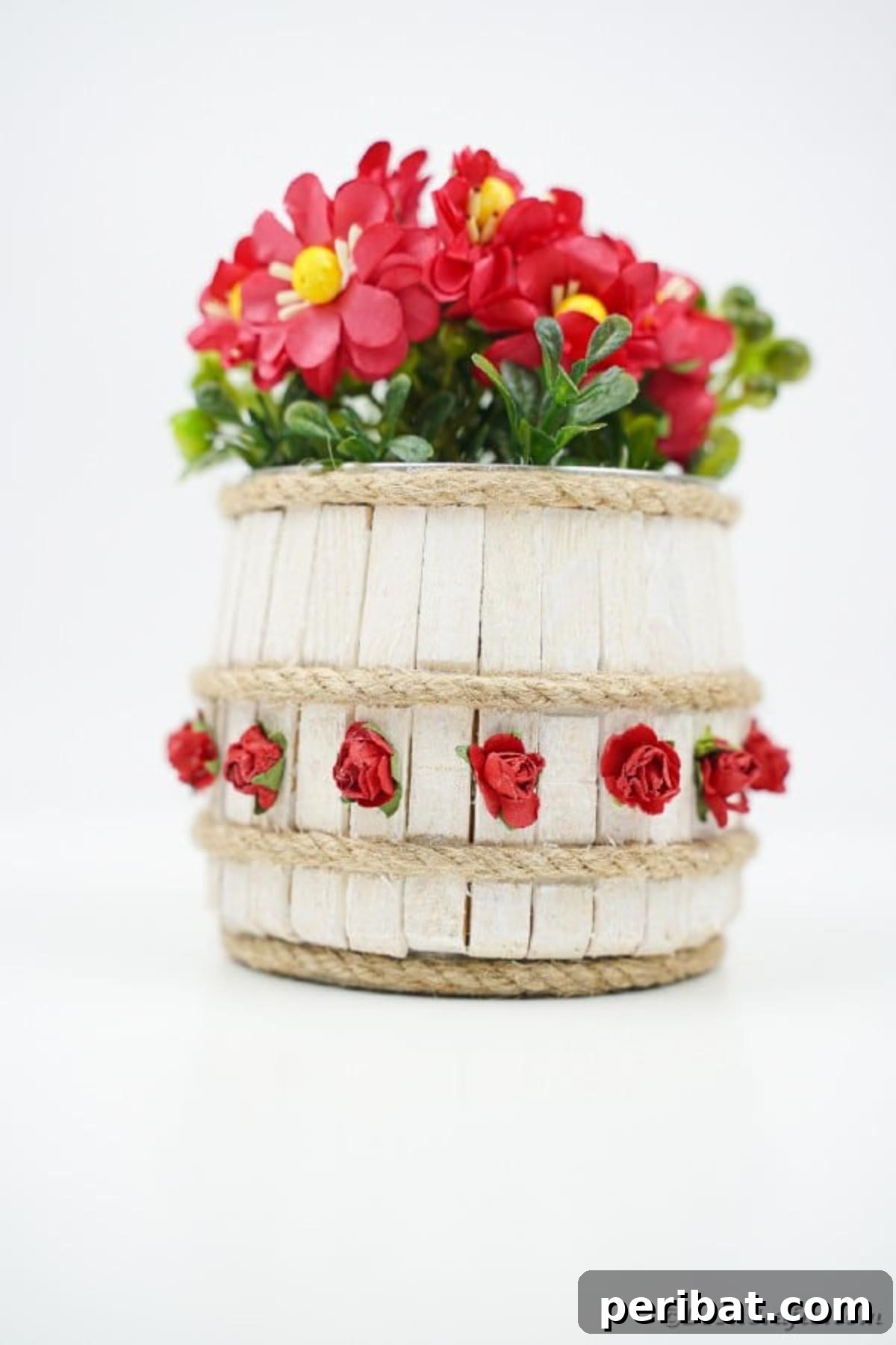 Pegged Tin Pot & Storage 6 Mini barrel made from clothespins filled with a vibrant red flower, perfect for home decor