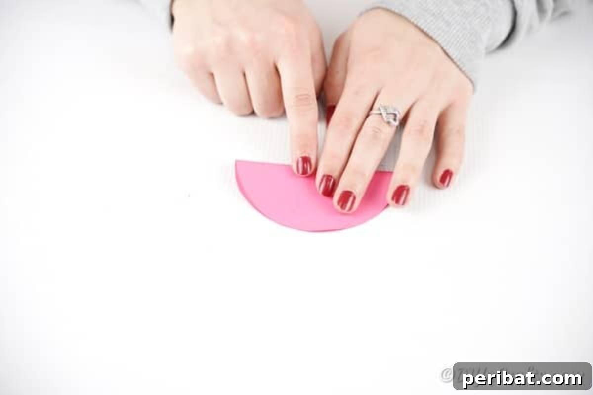 Fold paper circle in half