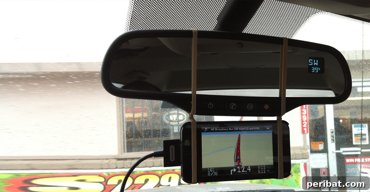 15 Smart Rubber Band Tricks for an Easier Everyday 5 Smartphone mounted to a car's rearview mirror using rubber bands for navigation