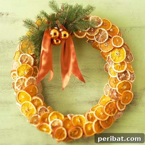 33 Festive Christmas Wreaths: Surprisingly Simple DIY Projects 16 Fragrant Citrus Christmas Wreath Decor